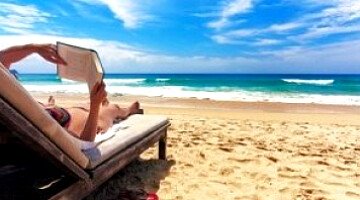 Why Tourists Will Pay Small fortunes for a spot of beach shade in the Algarve